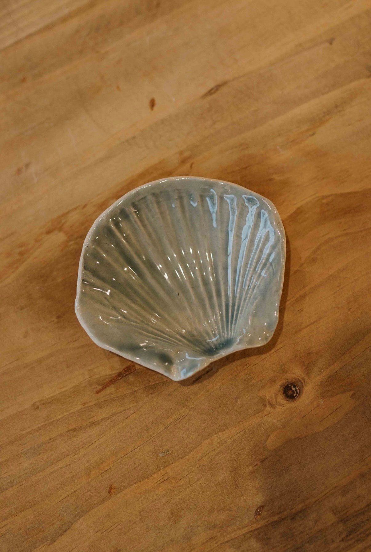 Ceramic Seashell Trinket Tray on a wooden surface